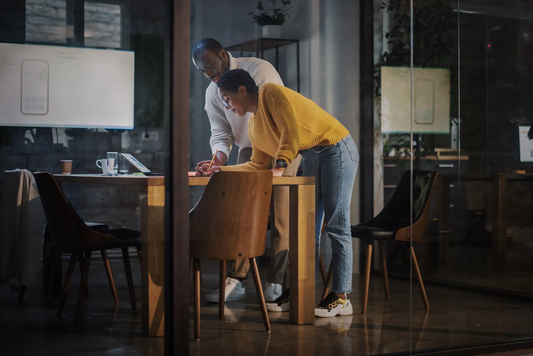 Man and woman working on a project